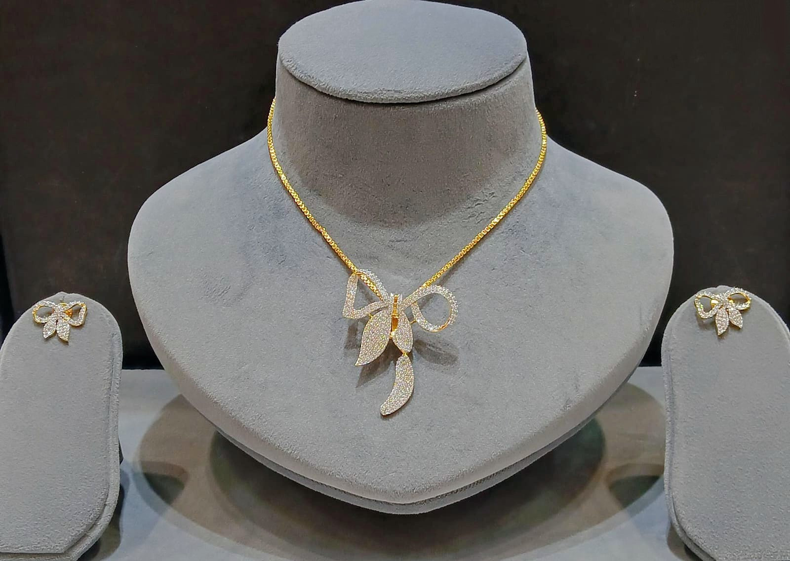 Designer Bow Pendant Set with Earrings