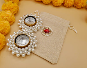 Set of 2 Pearl Diyas With  Embellished Jute Potli